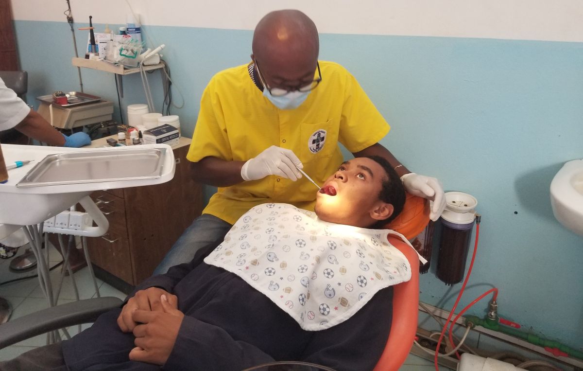 A student receiving dental care